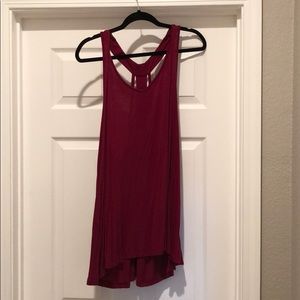 Fun Torrid burgundy tan top with cute back detail!
